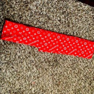 A supreme Louis Vuitton tie head band